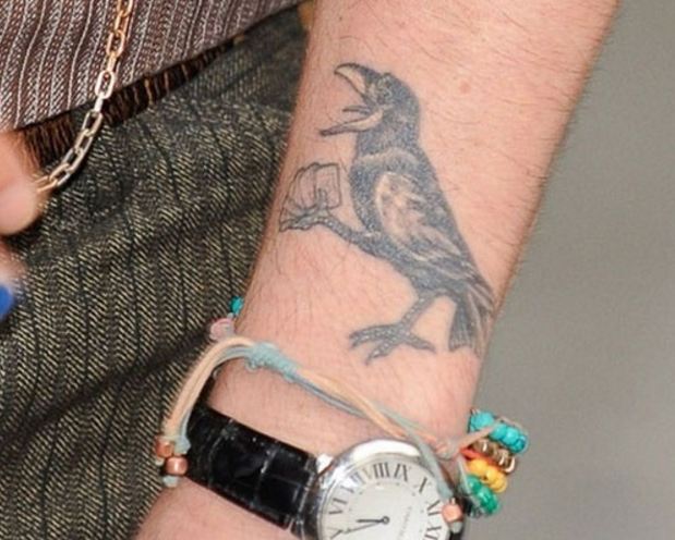 Johnny Depp Bird Tattoo