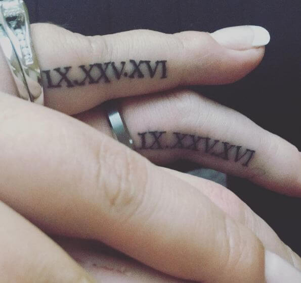 Roman Numeral Tattoos On Fingers