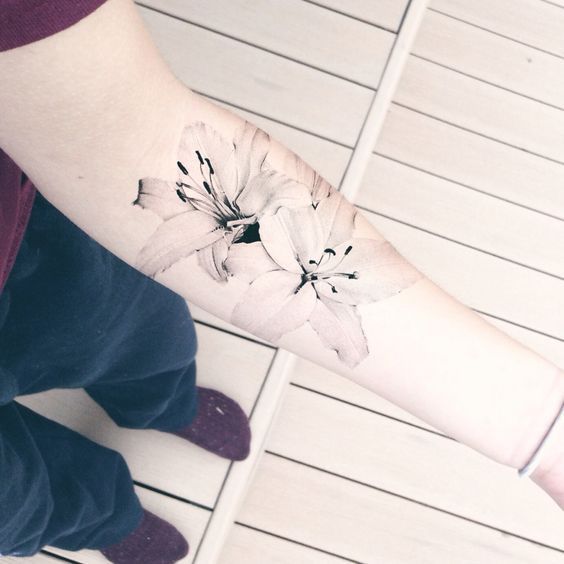 Lily Shoulder Tattoos Meaning Ideas Designs (15)