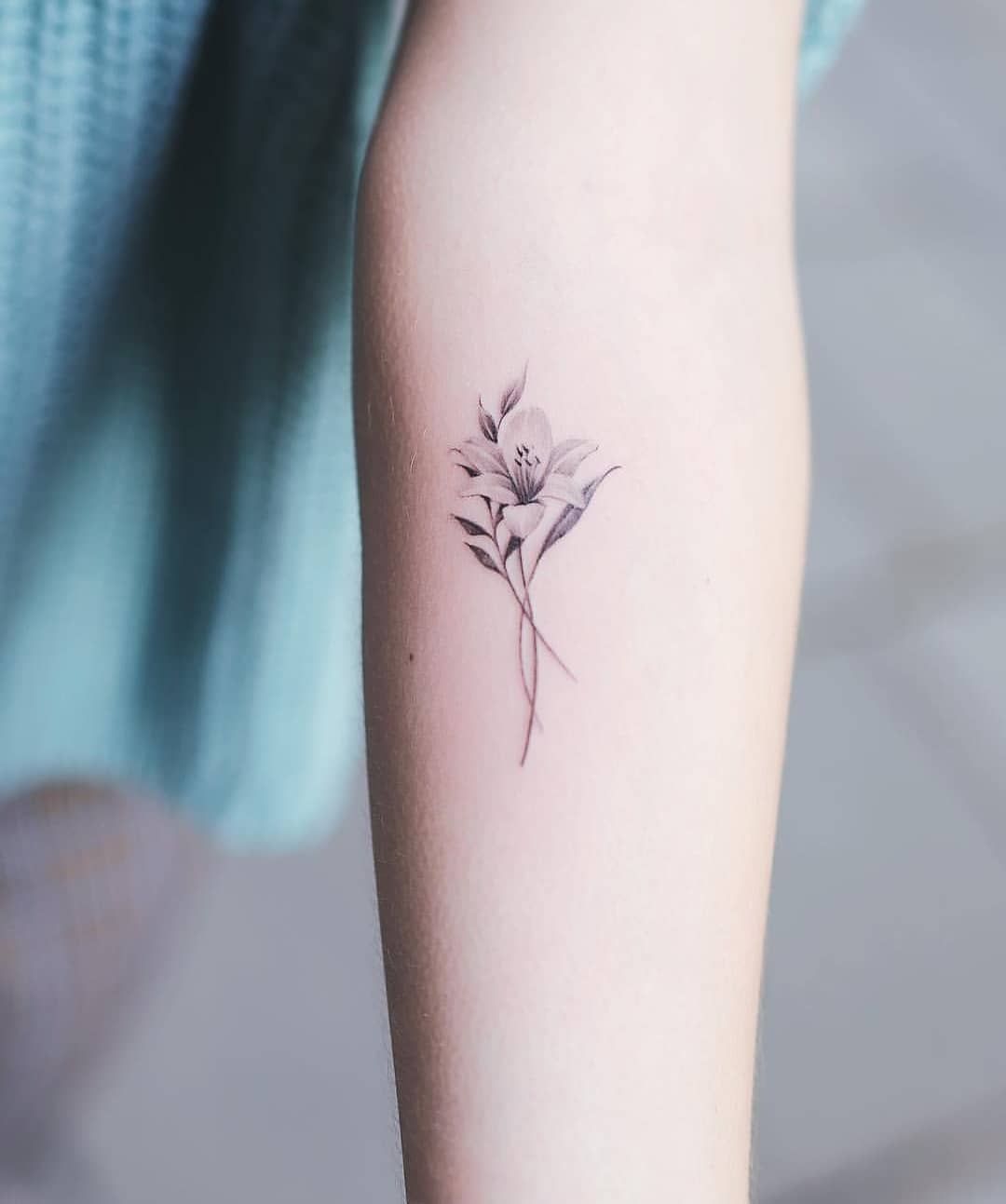 Lily Shoulder Tattoos Meaning Ideas Designs (205)